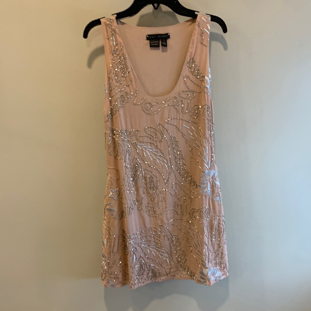 Gorgeous party dress in soft pink with embroidery and hardware details